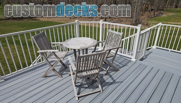 Enhance Foggy Wharf Decking with White Signature aluminum railing
