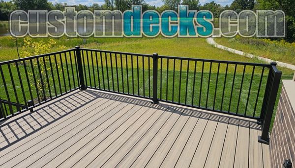 Enhance Honey Grove decking with Black Signature aluminum railing