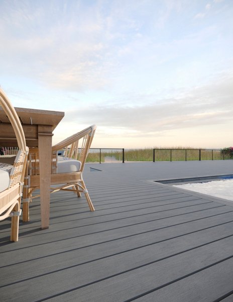 Boat docked at a dock made of Trex decking