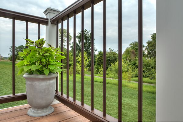 Trex Transcend railing with round aluminum balusters installed on a deck