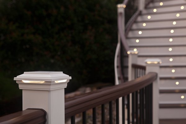 Small deck with cute plants and decor.