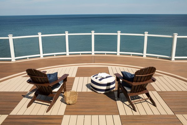 Checker composite deck with glass paneling overlooking the ocean