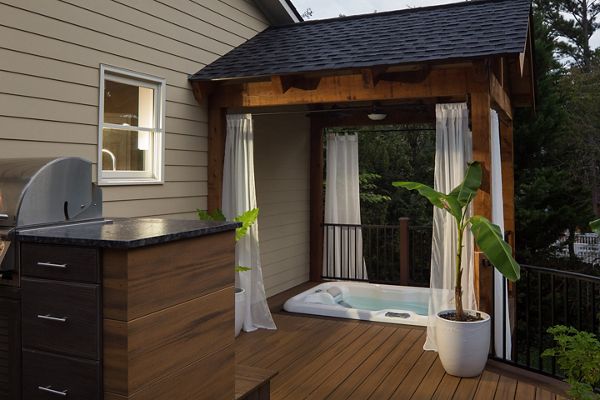 Deck with built in hot tub and roof