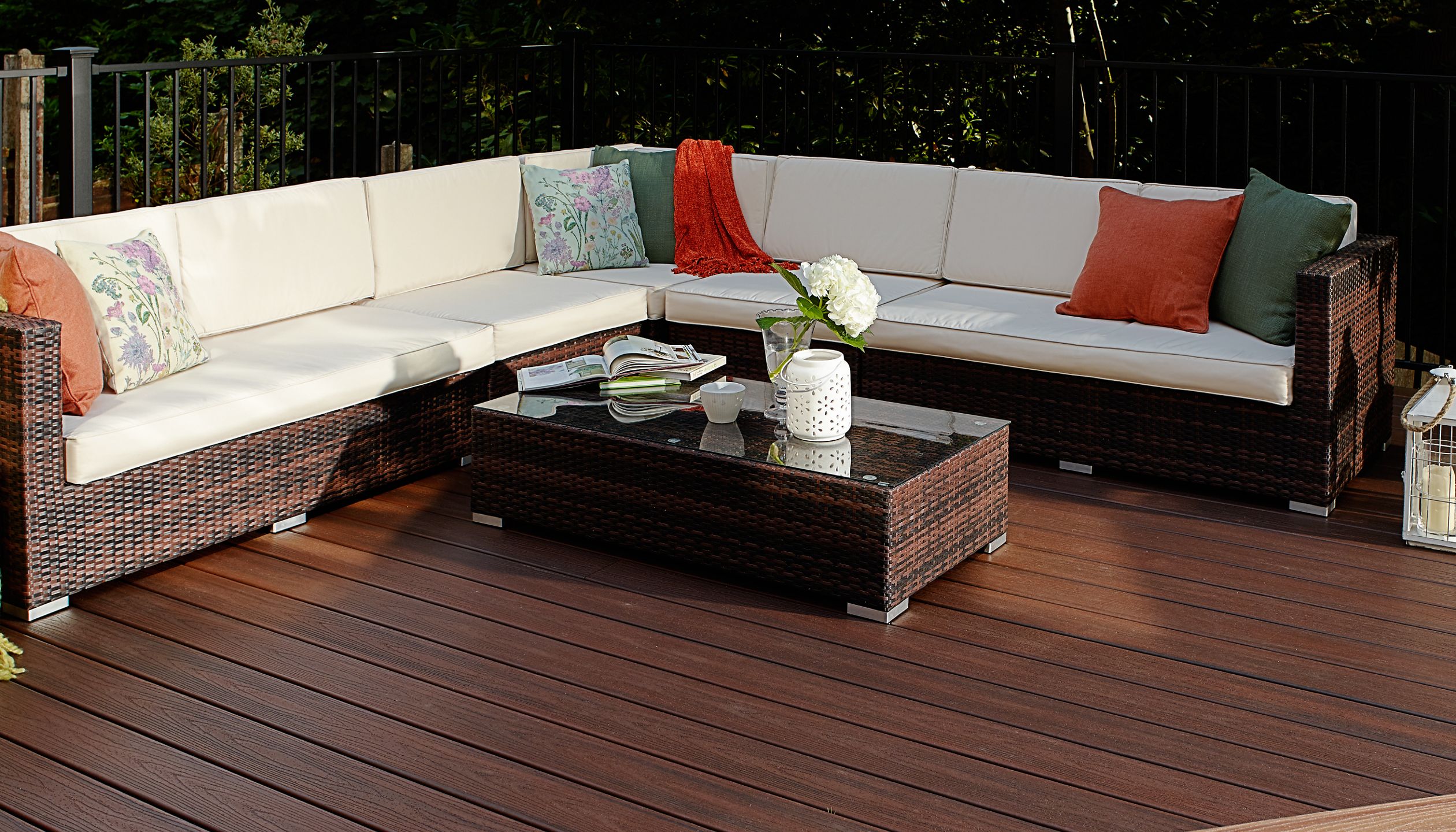 A Trex deck with multiple levels in the deep Red color Lava Rock in the Trex Transcend line.